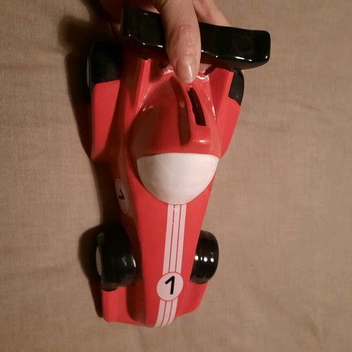 Car-shaped piggy bank like new unused