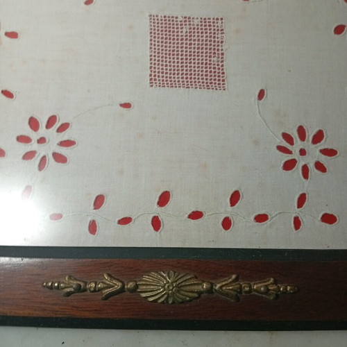 Traditional wooden serving tray used with handmade embroidery