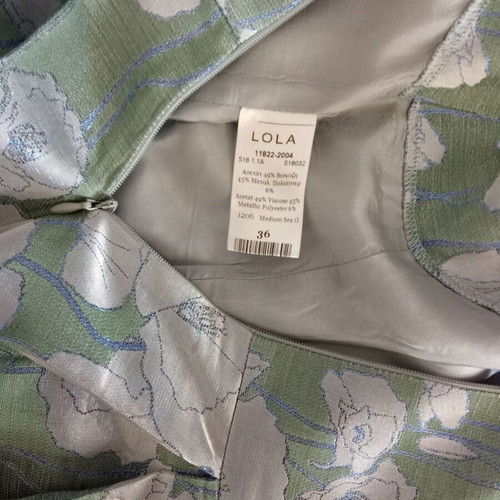 Lola cocktail dress like new, midi green with silver patterns