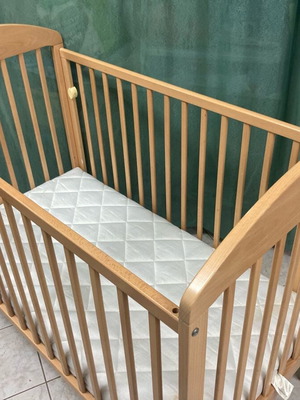 Baby cot with Greco Storm mattress like new
