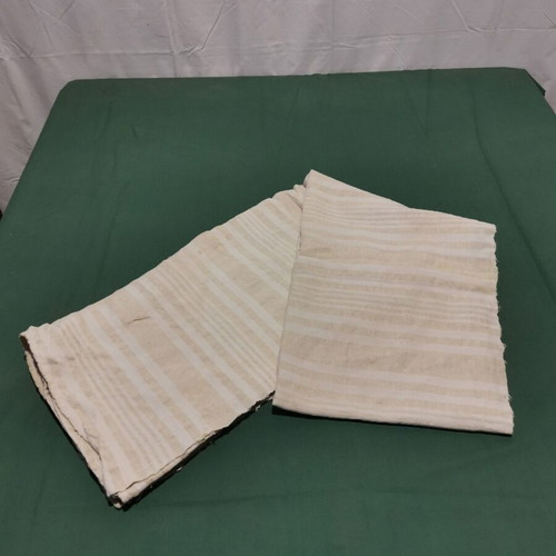 Woven wool bed sheet used with wear from 1930 era