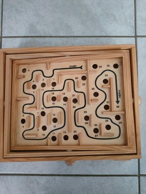 Wooden labyrinth with metal ball in very good condition