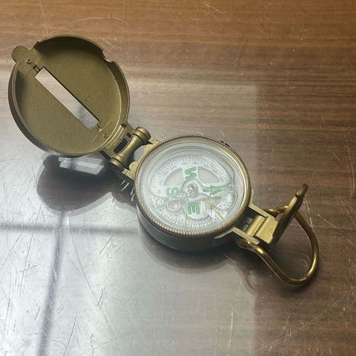 Bronze military-style compass used