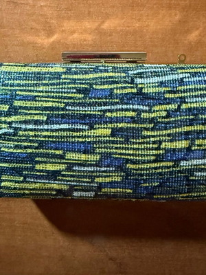 Clutch unused with gold strap multicolor handheld