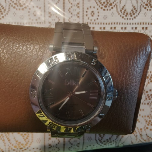 IKI Men's Quartz Watch with Brown Dial and Roman Numerals