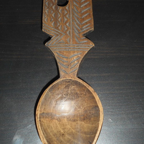 Carved wooden spoon with fork rustic kitchen decoration used