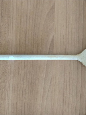 Wooden spatula spoon with hole used