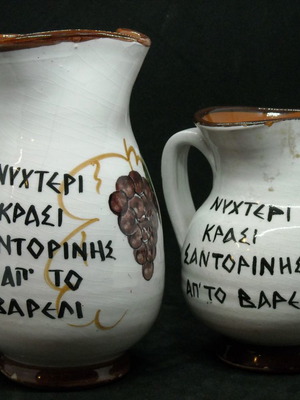 Clay jugs used "Nyhteri wine Santorini from the barrel"