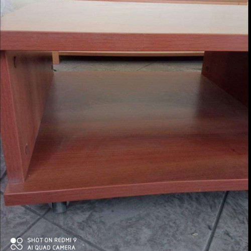 Wooden modern coffee table used with 2 levels and wheels