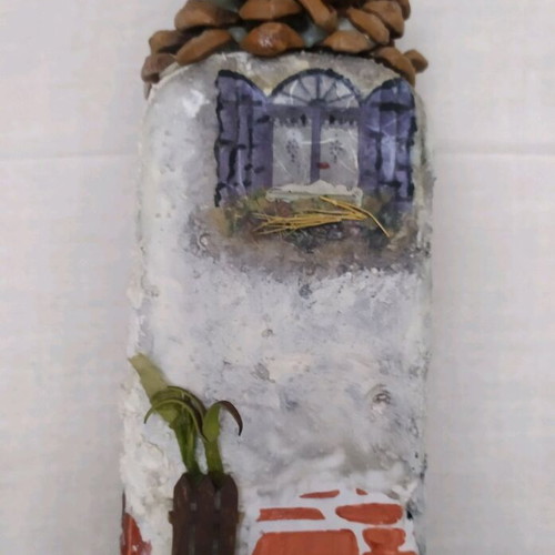 Decorative house used, made from bottle