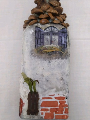Decorative house used, made from bottle