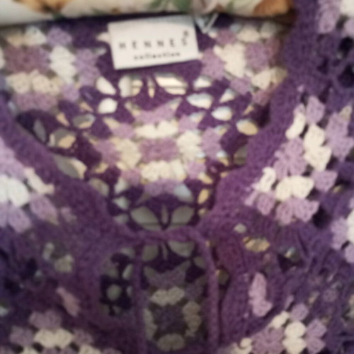 Handmade knitted poncho used in purple shades with fringes