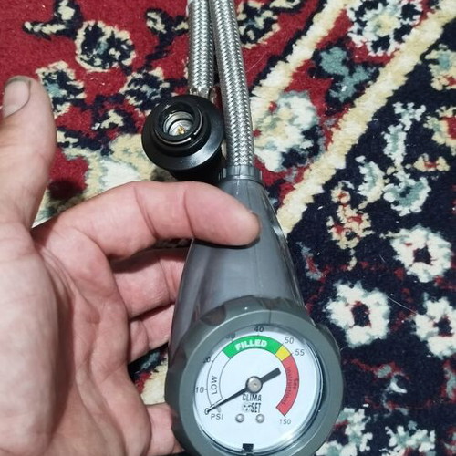 Air conditioner charging and checking manometer