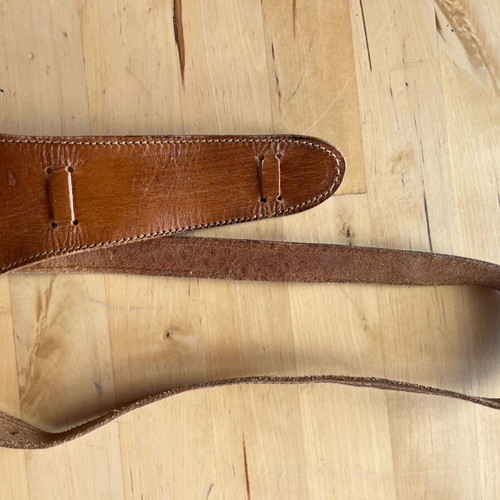 Camel leather belt used with metal details