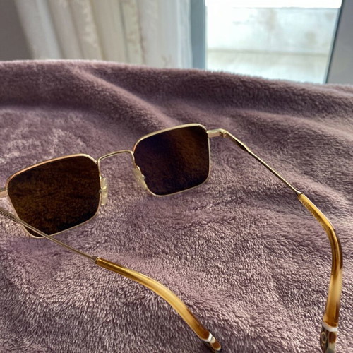Gigi Hadid sunglasses authentic new gold with case and cloth