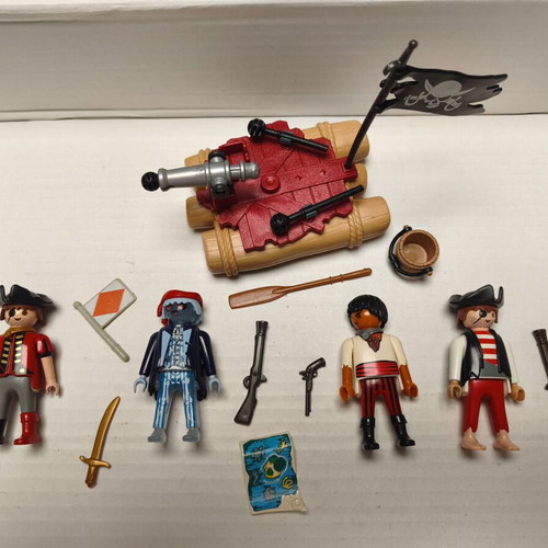 Playmobil pirates set used with 4 figures and functional cannon