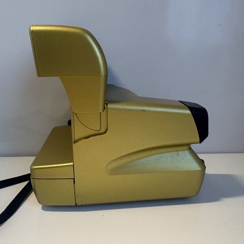 Polaroid OneStep AF camera, gold, for parts or repair