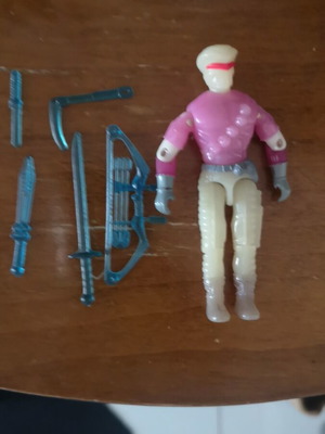 G.I. Joe action figure with weapons