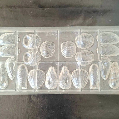 Polycarbonate chocolate mold used, summer shell and fish designs