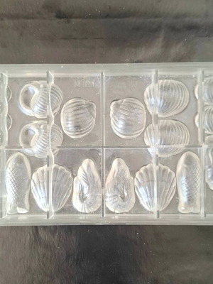 Polycarbonate chocolate mold used, summer shell and fish designs