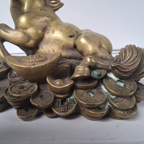 Bronze horse sculpture used, vintage wealth symbol on coins
