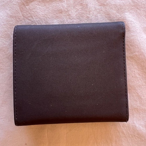 Mandarina Duck wallet used, purple color