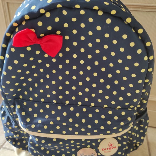 School backpack with pencil case used, polka dot design