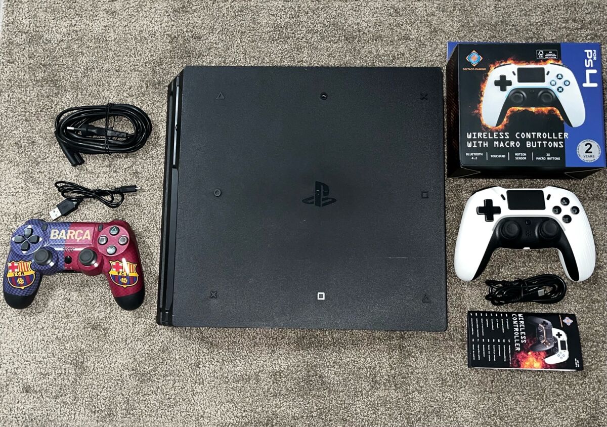 PlayStation 4 Pro 1TB used with 2… - € 245,00 - Vendora.cy