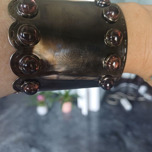 Metal cuff bracelet with decorative cabochon zirconia stones, used, black