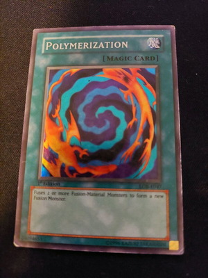 Yu-Gi-Oh Polymerization card used 1st edition super rare