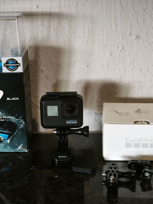GoPro HERO 7 Black used with extra battery, dual charger, Lowepro case and accessories