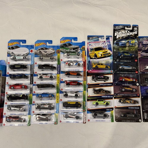 Hot Wheels sealed collection with Ferrari, Porsche, Lamborghini, JDM models