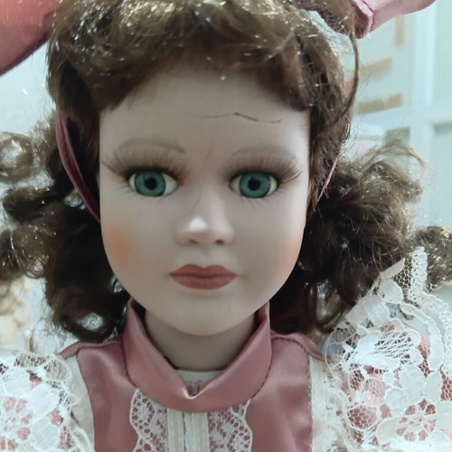 Porcelain doll used with cracked forehead from fall