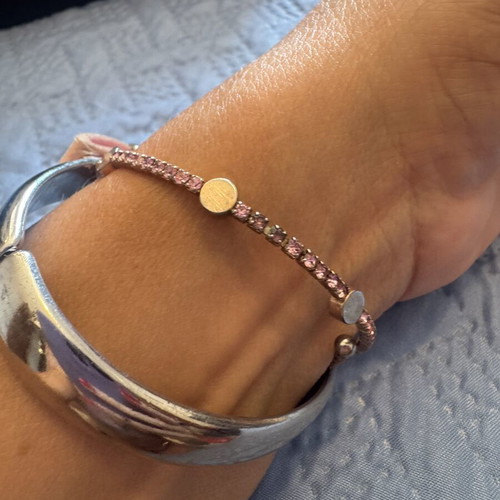 Bracelets pack of two, one collectible pink ribbon, used