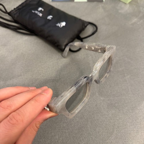 Off White marble sunglasses like new with box and case