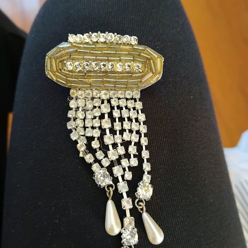 Brooch with stones like new, gray