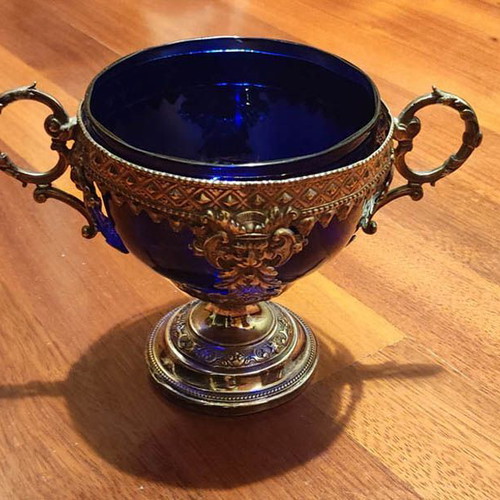 Decorative vessel used with glass interior and lid