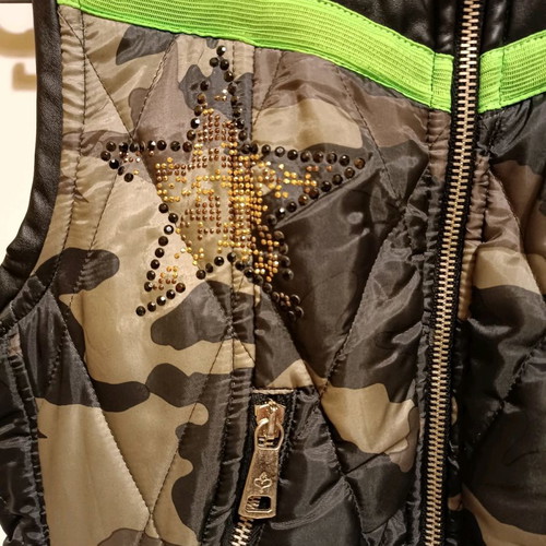 Rossodisera sleeveless jacket used with metallic details