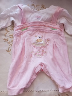 Baby romper 6-9 months, white and pink, yellowed