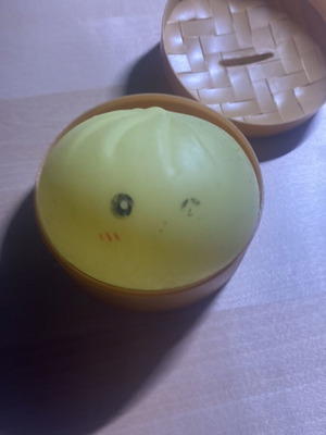 Dumpling yellow stress toy used, eyes slightly faded