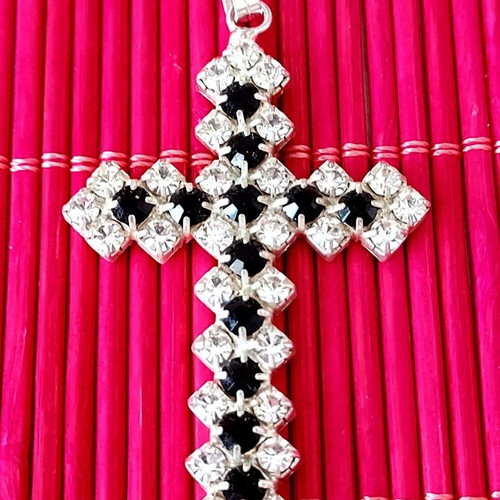 Cross used with white and black rhinestones