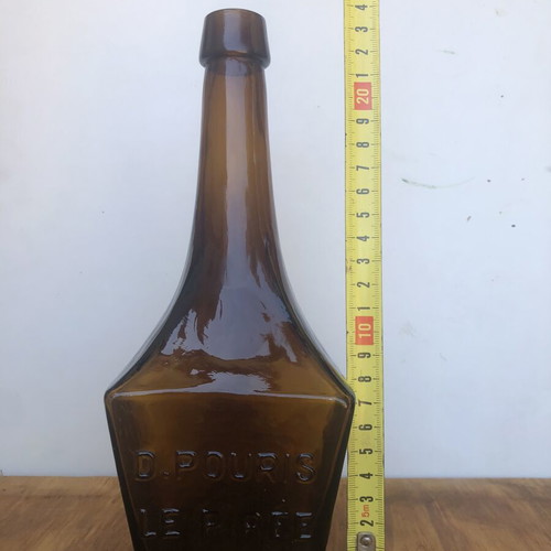 Antique glass bottle D.POURIS LE PIRÉE amber color