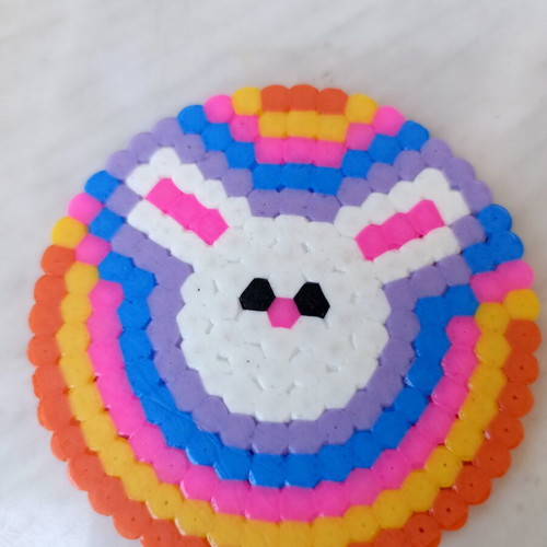 Set of 4 handmade fuse-bead coasters with colorful pixel designs
