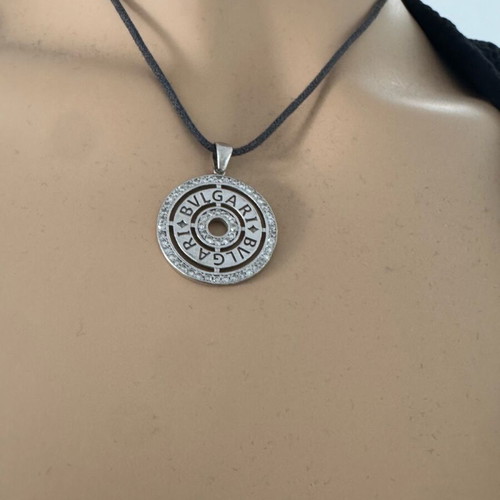 Bvlgari necklace with leather cord gray like new