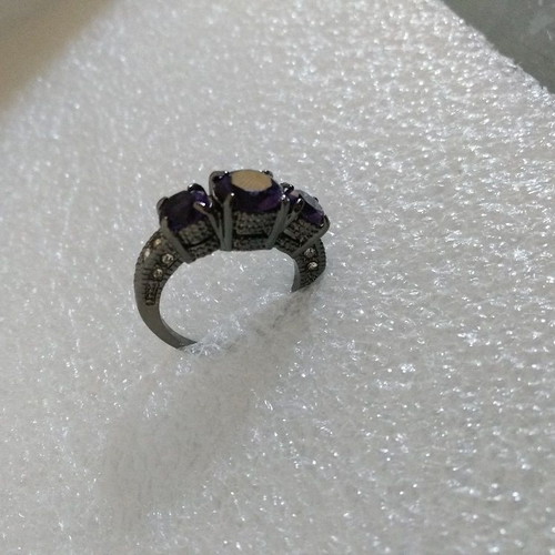 Ring with Purple Crystals and Black Plated Finish like new