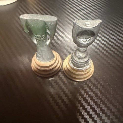 Miniature trophies used, official replicas