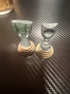 Miniature trophies used, official replicas