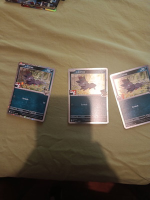N's Zorua holo stamped Pokemon cards, set of 3