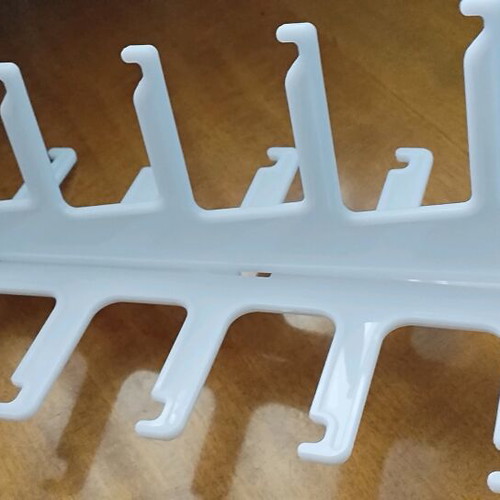 Organizer for Sunglasses like new, white plastic