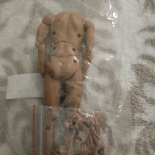 Male doll body new with joints about 13 centimeters